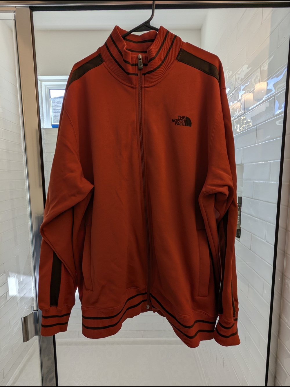 The North Face Orange Crewneck with Brown Logo
